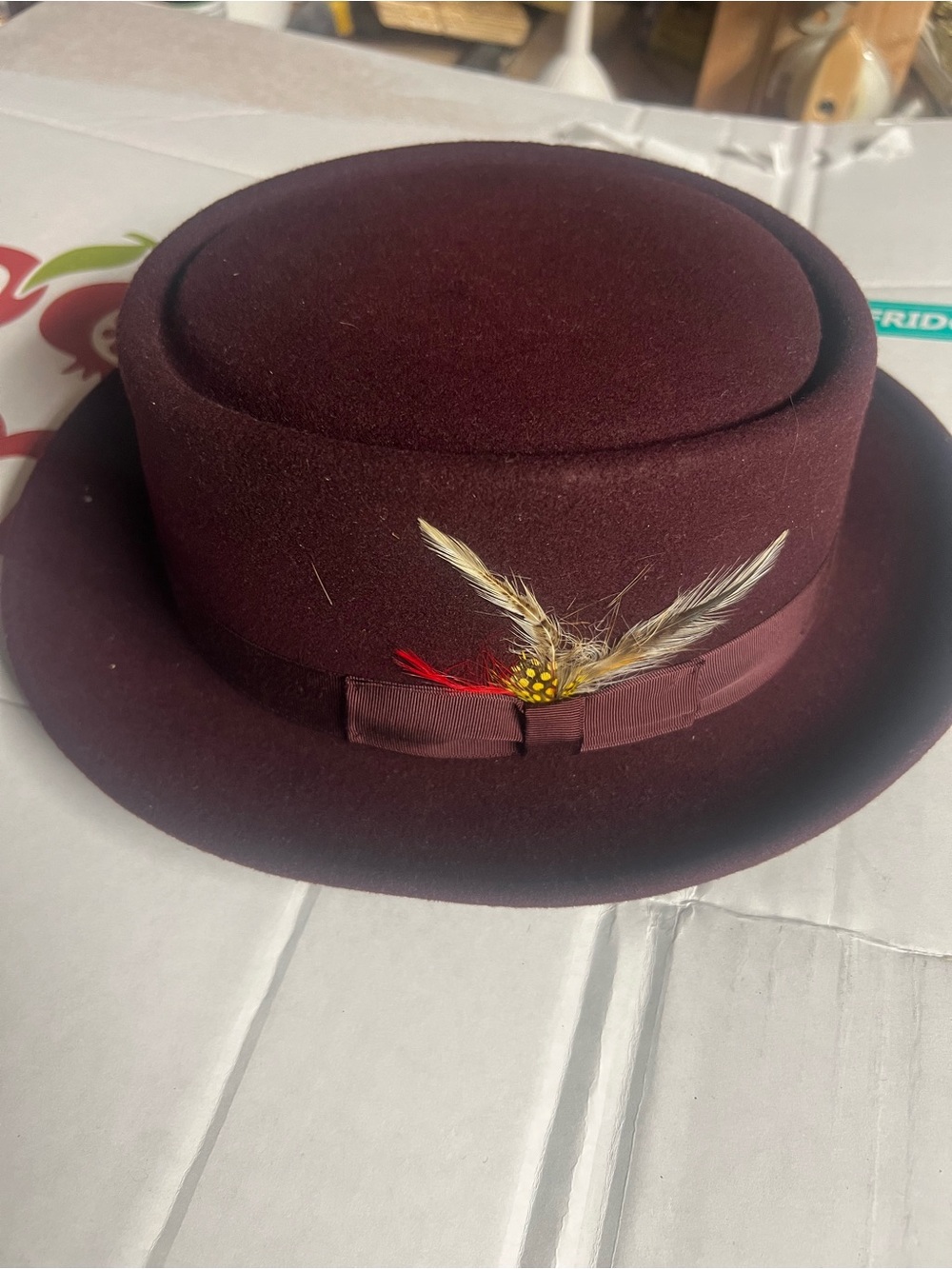 Burgundy Woolfelt Pork Pie Hat with Feather Trim